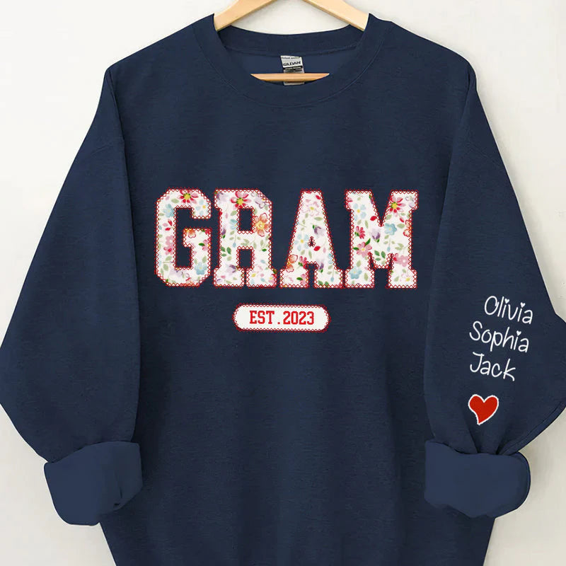 Sweat-shirt personnalisé avec nom d'enfant sur la manche, modèle Flower Nana Mom Est Year