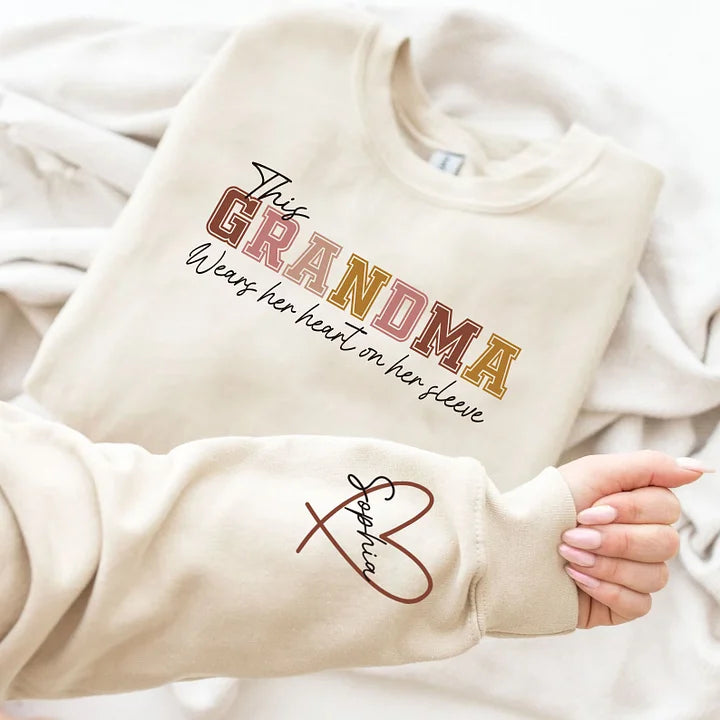 Tragen Sie ein Sweatshirt mit Herz am Ärmel für Mama und Oma